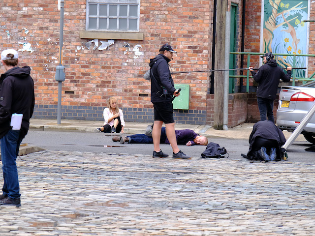 Gary and Sarah film the socially-distanced stunt on Coronation Street