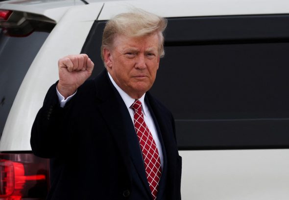 Former U.S. President and Republican presidential candidate Donald Trump gestures after arriving at Aberdeen International Airport in Aberdeen, Scotland, Britain on May 1, 2023.