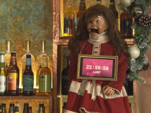 The McQueens' blackmail doll on Hollyoaks