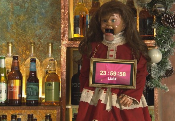 The McQueens' blackmail doll on Hollyoaks