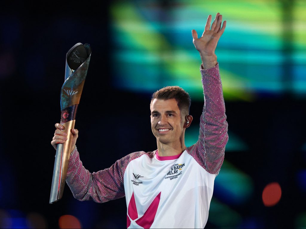 Commonwealth Games - Opening Ceremony - Alexander Stadium, Birmingham, Britain on July 28, 2022 Britainâs Max Whitlock carries the Queens Baton during the opening ceremony