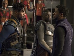 Michael B. Jordan as Erik Killmonger and Chadwick Boseman as T'Challa in Black Panther