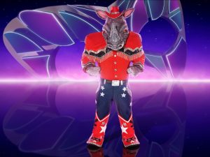 Charlie Simpson as Rhino, winner of The Masked Singer 2023