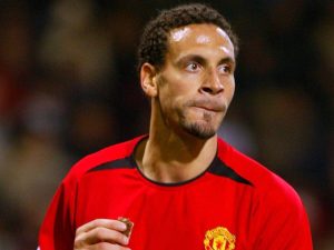Rio Ferdinand playing for Manchester United