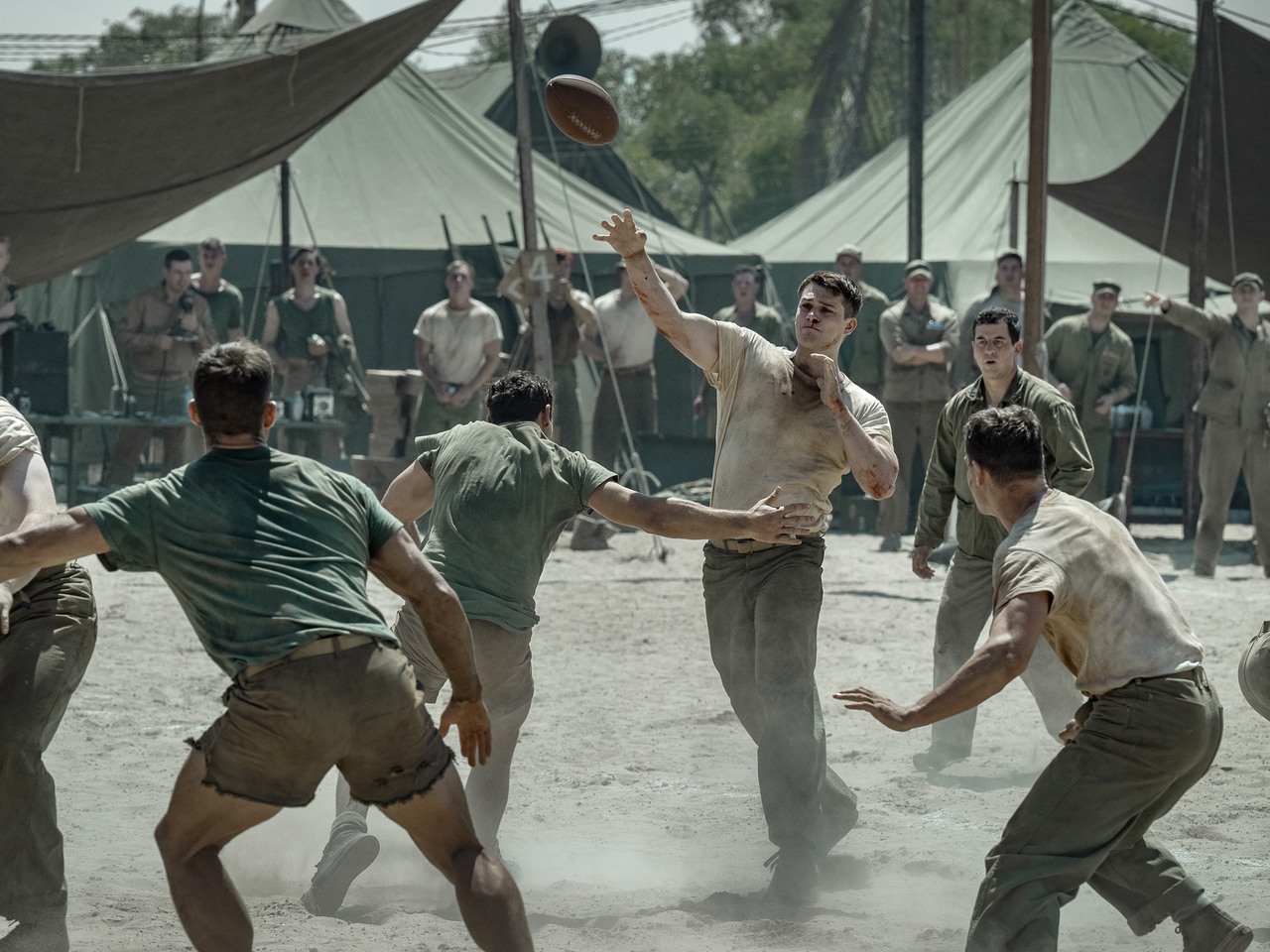 Nicholas Galitzine as John McLaughry in The Mosquito Bowl