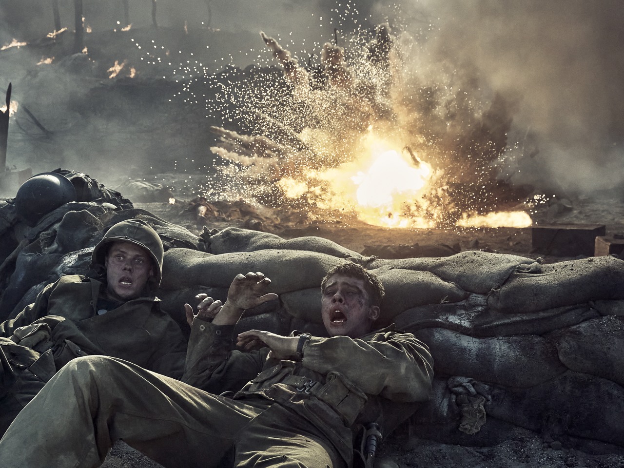 Bill Skarsgård as Bob Bauman and Nicholas Galitzine as John McLaughry in The Mosquito Bowl