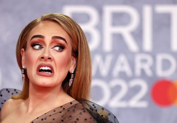 Adele poses as she arrives for the Brit Awards at the O2 Arena in London, Britain on February 8, 2022