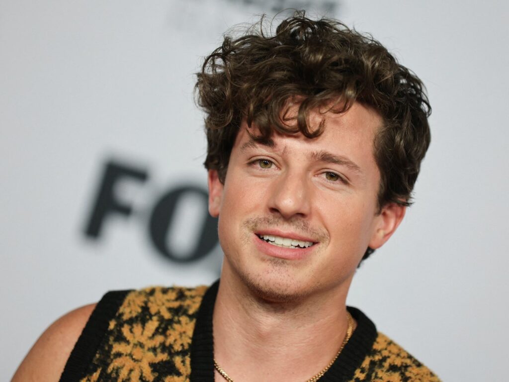 Charlie Puth poses on the red carpet at the iHeartRadio Music Awards, at Shrine Auditorium in Los Angeles, Californian, U.S. on March 22, 2022.
