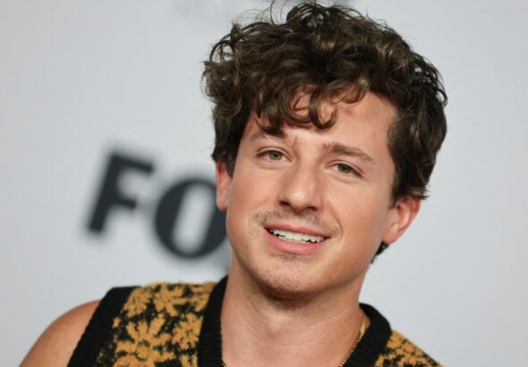Charlie Puth poses on the red carpet at the iHeartRadio Music Awards, at Shrine Auditorium in Los Angeles, Californian, U.S. on March 22, 2022.