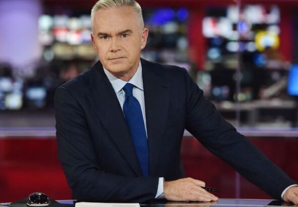 Huw Edwards presenting BBC News