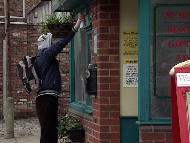 A vandal on Coronation Street on March 22, 2021