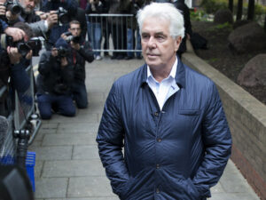 Max Clifford arriving at court in 2014