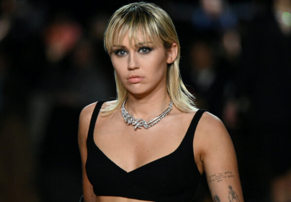 Miley Cyrus presents a creation from the Marc Jacobs Fall/Winter 2020 collection during New York Fashion Week in New York, U.S. on February 12, 2020.