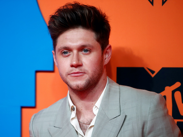 Niall Horan poses on a red carpet as he arrives at the 2019 MTV Europe Music Awards at the FIBES Conference and Exhibition Centre in Seville, Spain on November 3, 2019.