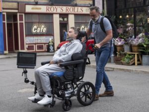 Paul Foreman (Peter Ash) and Billy Mayhew (Daniel Brocklebank) outside Roy’s Rolls in Coronation Street