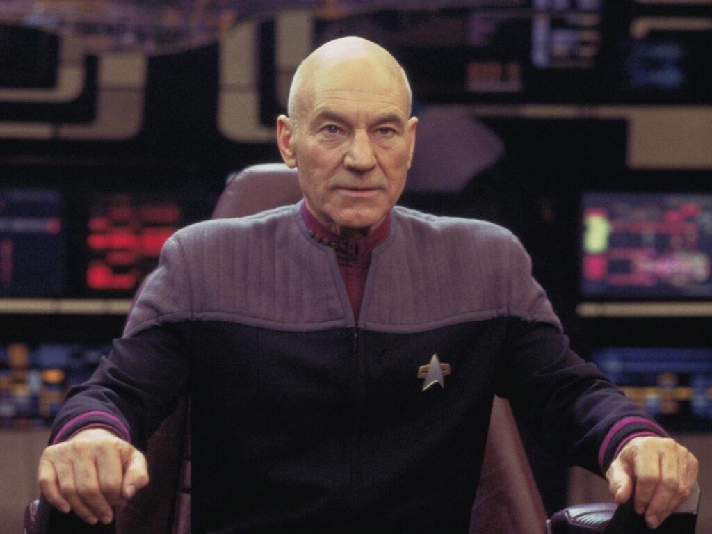 Sir Patrick Stewart as Captain Jean-Luc Picard in Star Trek: Nemesis