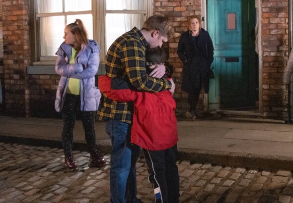 Chesney hugs Joseph as Gemma and Bernie watch on Coronation Street on February 28, 2022