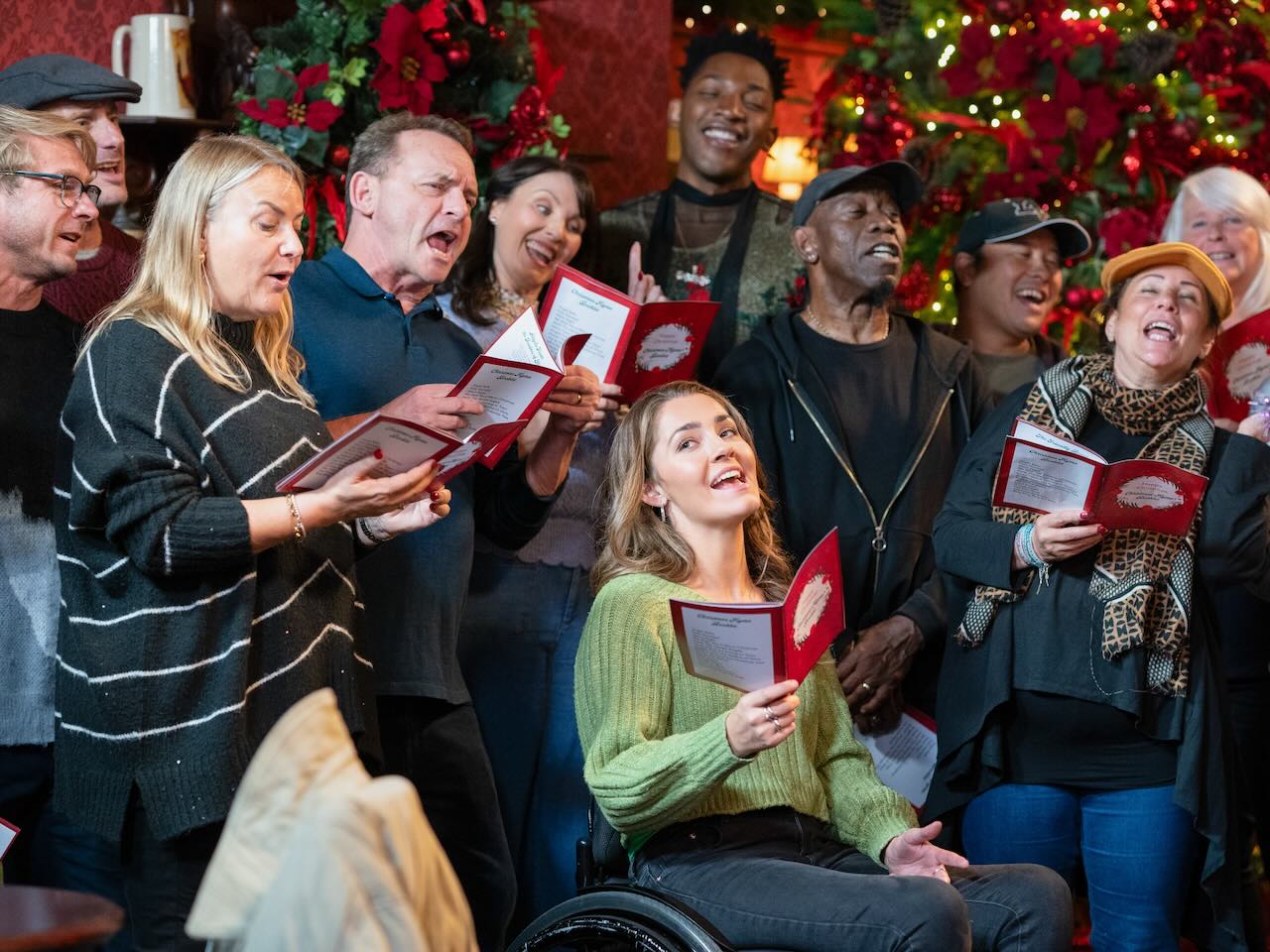 The Walford choir on EastEnders on December 23, 2024