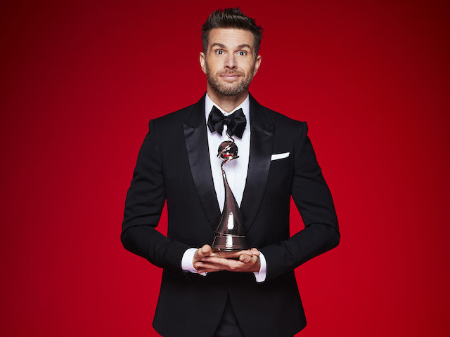 Joel Dommett with the National Television Award for the National Television Awards 2021