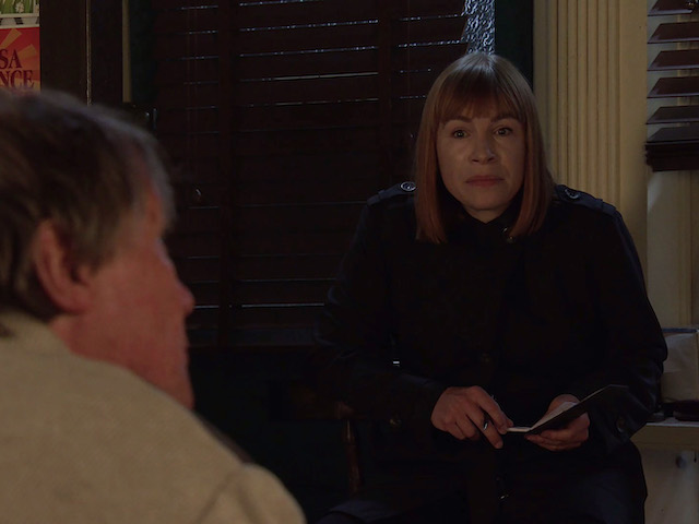 Roy and a police officer on Coronation Street on October 22, 2021