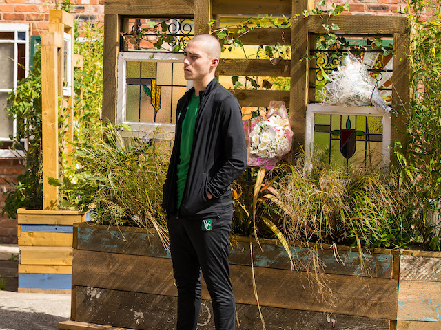 Corey at Seb's memorial garden on Coronation Street on October 4, 2021