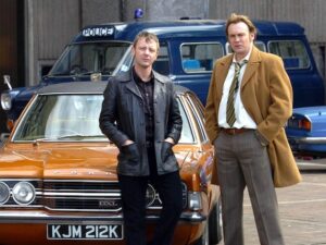 John Simm as Sam Tyler and Philip Glenister as Gene Hunt in Life on Mars