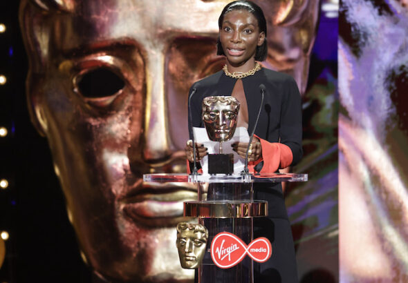 Michaela Coel with her BAFTA TV Awards for I May Destroy You
