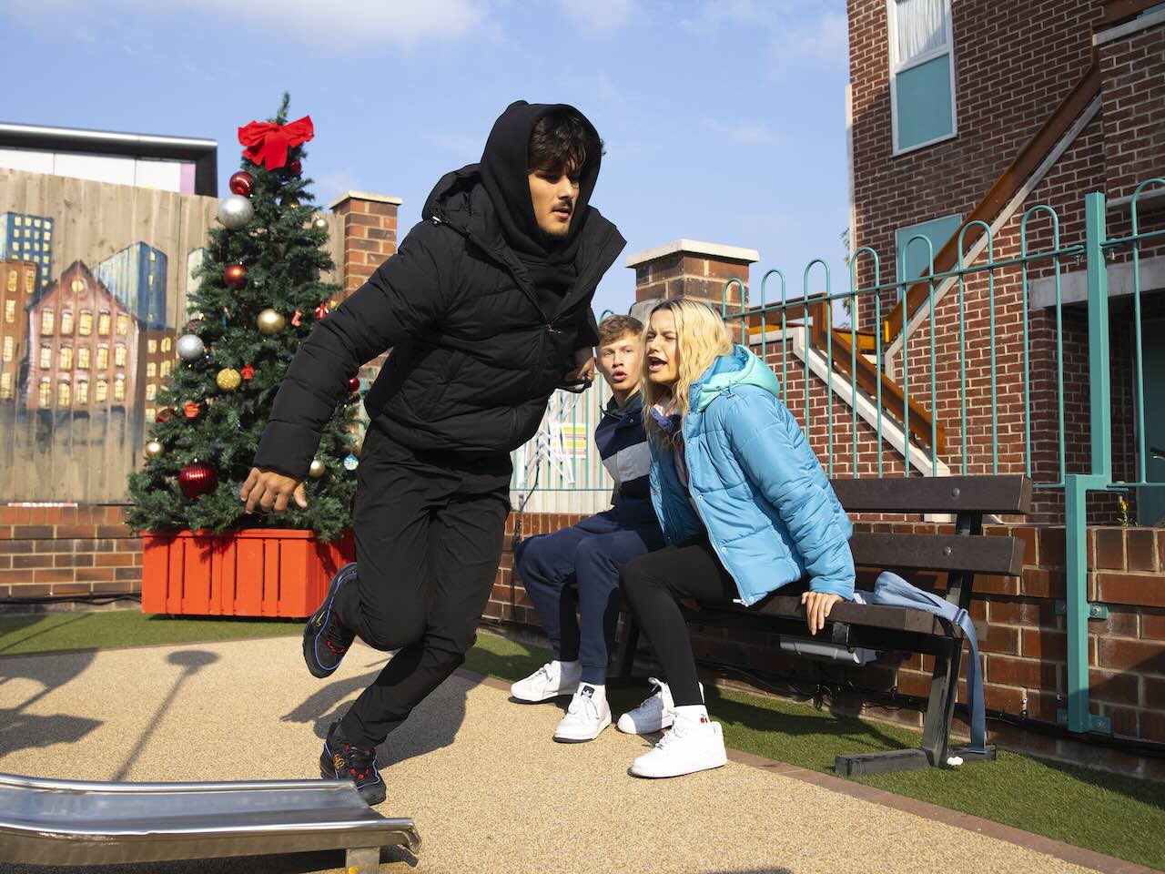 Mason chases the bag thief as Dylan and Betsy watch on Coronation Street on December 13, 2024