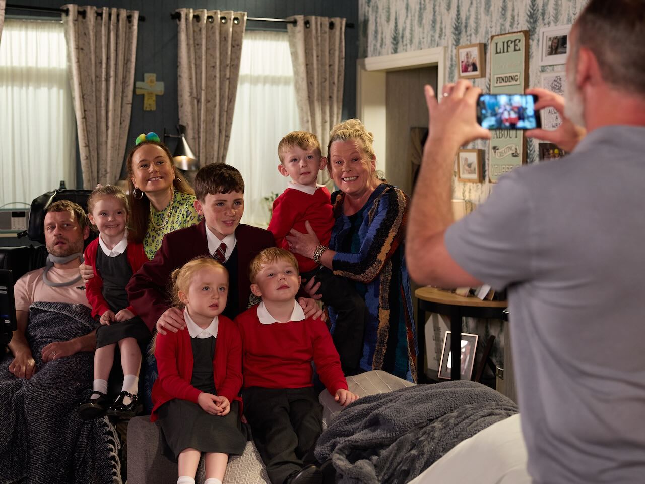 Billy photographs Paul, Gemma, Bernie and the children on Coronation Street on September 2, 2024